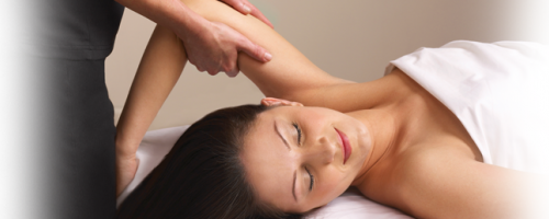 woman receiving arm massage