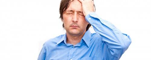 man with tension headache