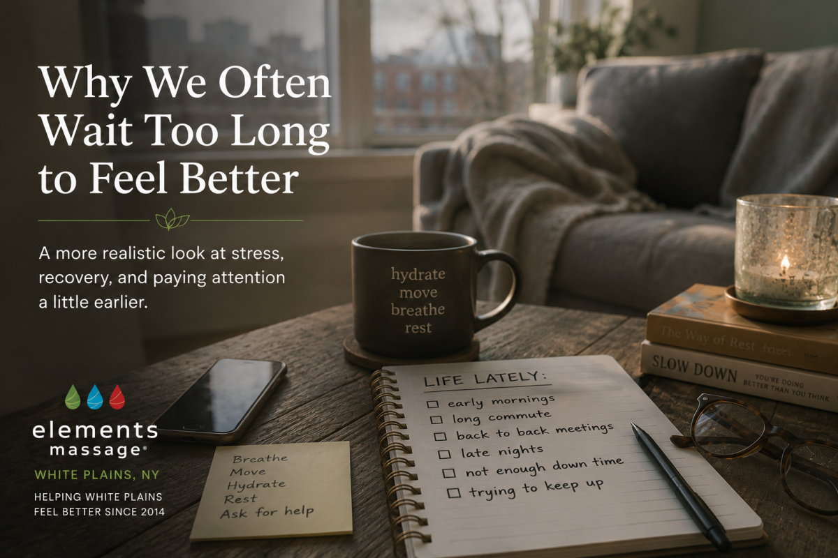 Editorial lifestyle image for an Elements Massage White Plains article about stress, recovery, and self-care. A notebook listing signs of a busy schedule sits on a coffee table alongside a phone, glasses, books, and a mug in a softly lit living room, illu