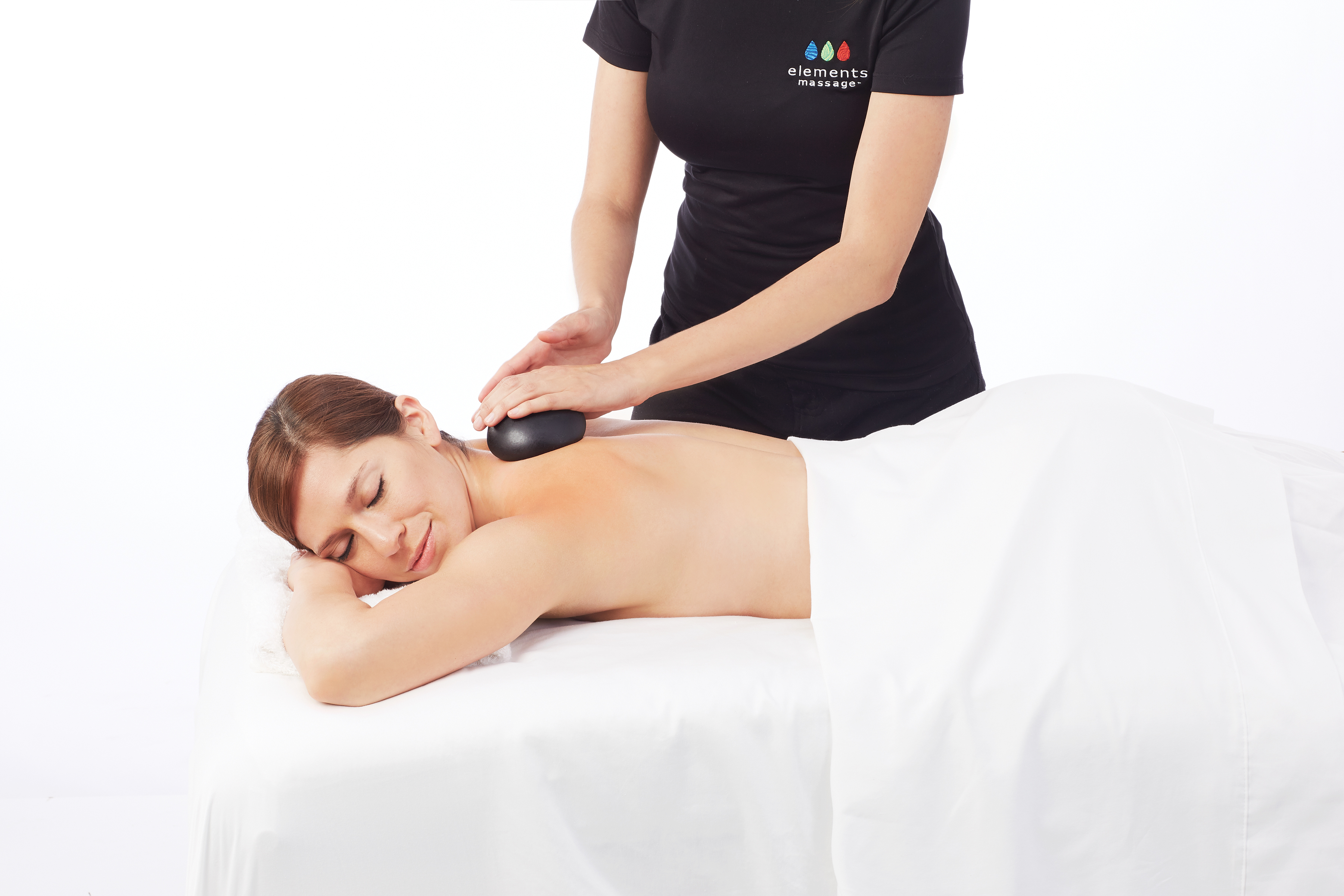 Elements Massage suggests implementing hot stones into your regular massage therapy s...