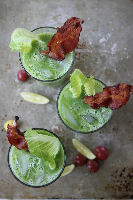 spicy bloody mary dyed green with bacon