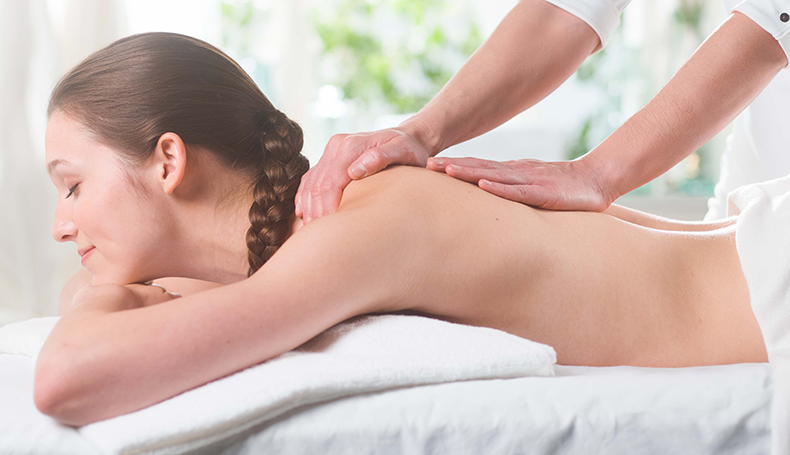 woman receiving a back massage